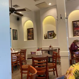 a restaurant with tables and chairs