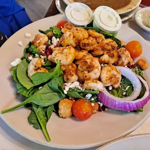 Spinach salad. So many tasty shrimp! Fresh and delicious veggies.