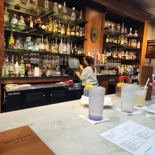 a bar with a bartender