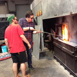 Kyle, our instructor assisting during a glassblowing class.