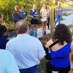One of our walking tours discussing New Orleans history with water