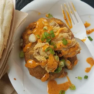 Eggplant crab cake topped with fried oysters