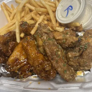 French Quarter Wings, Garlic Parmesan Wings, and Cajun Fries