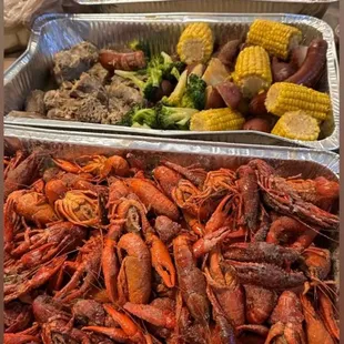 Cooked crawfish ($8.99/lb), turkey necks, broccoli, sausage, potatoes and corn