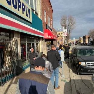customers waiting outside the store