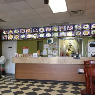 a restaurant with a checkered floor