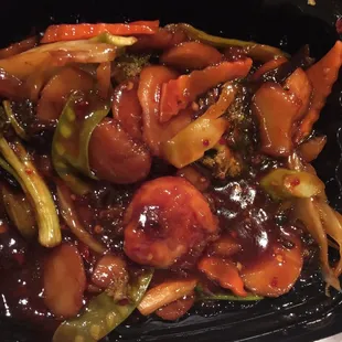 Saturated shrimp and soggy veggies in "garlic sauce" that tastes like BBQ sauce.