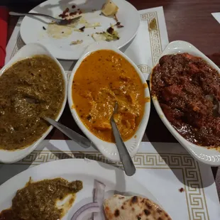 Saag paneer, tikka masala chicken, fish curry
