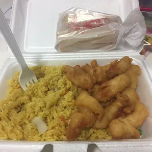 Lunch portion sweet and sour chicken, fried rice, spring roll (I ordered an extra one)