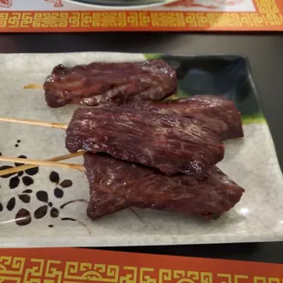 Teriyaki beef stick (5pc) fiance took one before I could get a pic