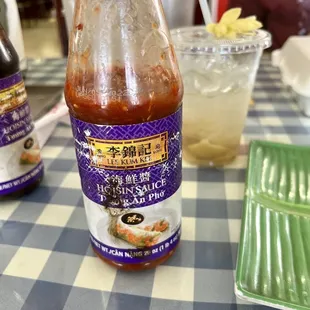 You know a place is  when they serve the garlic hot sauce in a recycled hoisin bottle