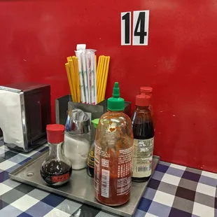 Sauces, napkins, and utensils.