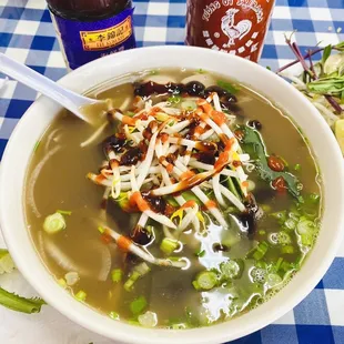 2nd picture of the P1 Pho with added Sriracha and Hoison Sauce!! I purchased the large size bowl!