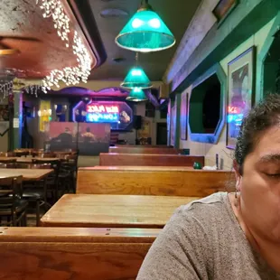 a woman eating a hot dog