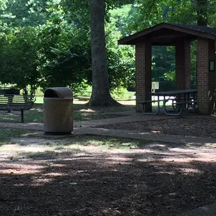 Plenty of covered picnic tables