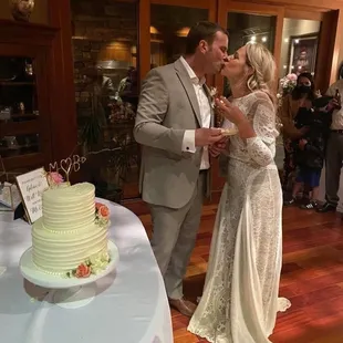 Cutting the cake! It looked flawless, and tasted even better!