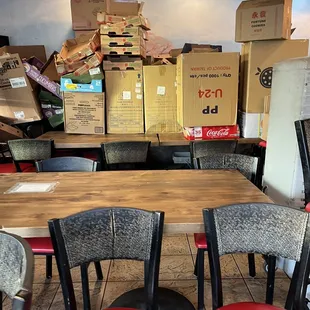 The inside with so many boxes that should be thrown away to keep the restaurant clean