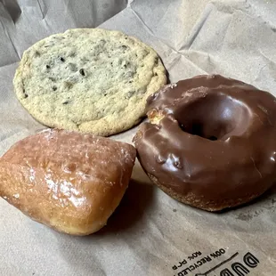 chocolate chip cookie, chocolate old fashioned donut, and glazed beignet