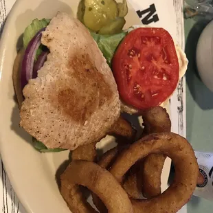 Grilled tenderloin sandwich with onion rings