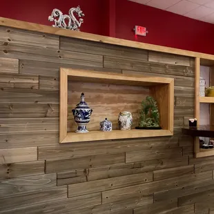 a wood paneled wall in a restaurant