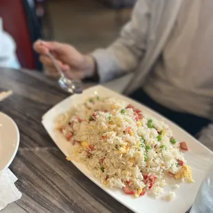 a plate of rice and vegetables
