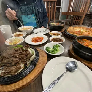 Absolutely delicious! Pictured: beef bulgogi, bibimbap, kimchi pancake, &amp; tofu soup.