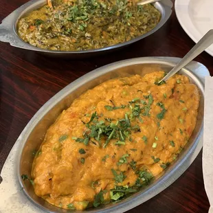 Bhartha (front) and Chicken Tikka Saag (back)