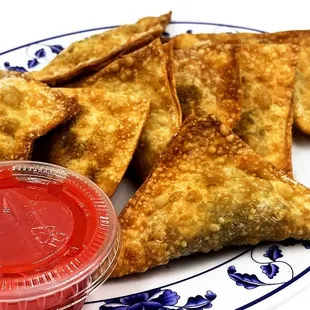 Chicken Wontons (8 pcs) （(炸云 几) Wrapped wonton filled with ground chicken that&apos;s crispy and bursting with flavor in the inside.