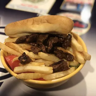 a beef sandwich and fries