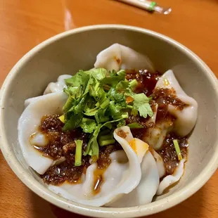 Spicy scallion red oil dumplings