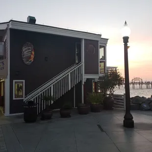 people walking in front of a restaurant