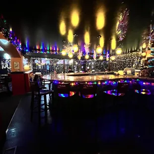 Beautifully Lit and Curved Bar with Incredible Stonework