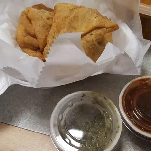 Samosa and Keema Mutter for take out. Dipping sauces were fantastic! Rice for the Keema Mutter was delicious.