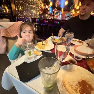 Chicken Korma Fish Tikki Masala , cute kid enjoying korma, husband enjoying Hottest spice level Shrimp Tandoori Masala .