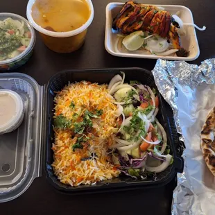Tandoori Chicken, Chicken Tikka, Raita, Salad, Naan and Rice!