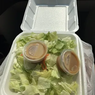 Two side salads in one big container. I usually order two side salads for my mom and I to share cause we both love them.