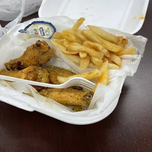 Lemon pepper chicken and fries