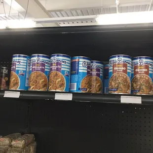 a shelf of canned food