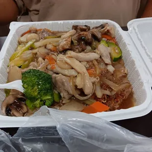 a take out container of food