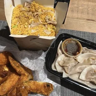 Chicken fried rice, dumplings, and wings.