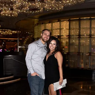 a man and a woman posing for a picture