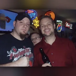 two men posing for a picture