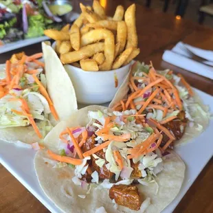 Crispy Korean Chicken taco with side of fried