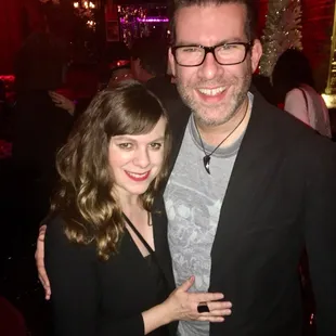 a man and woman posing for a picture