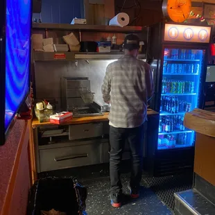 Bar tender making food
