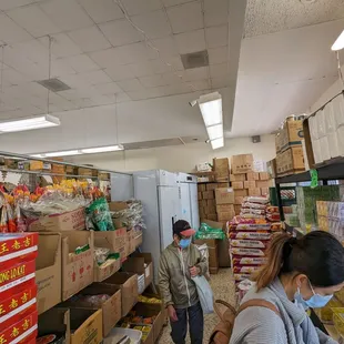 two people in a grocery store