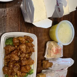 Full meal with spring rolls, egg rolls, rice and multiple entrees