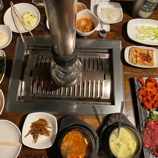 Banchan, Kimchee soup, omelette, meat combo 2, set up Charcoal grill