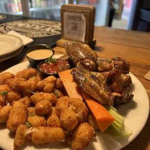 Hickory Smoked Jerk Chicken Wings and Wisconsin Cheese Curds! So good!