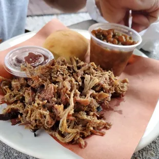 1/2 pound pulled pork with baked beans and roll